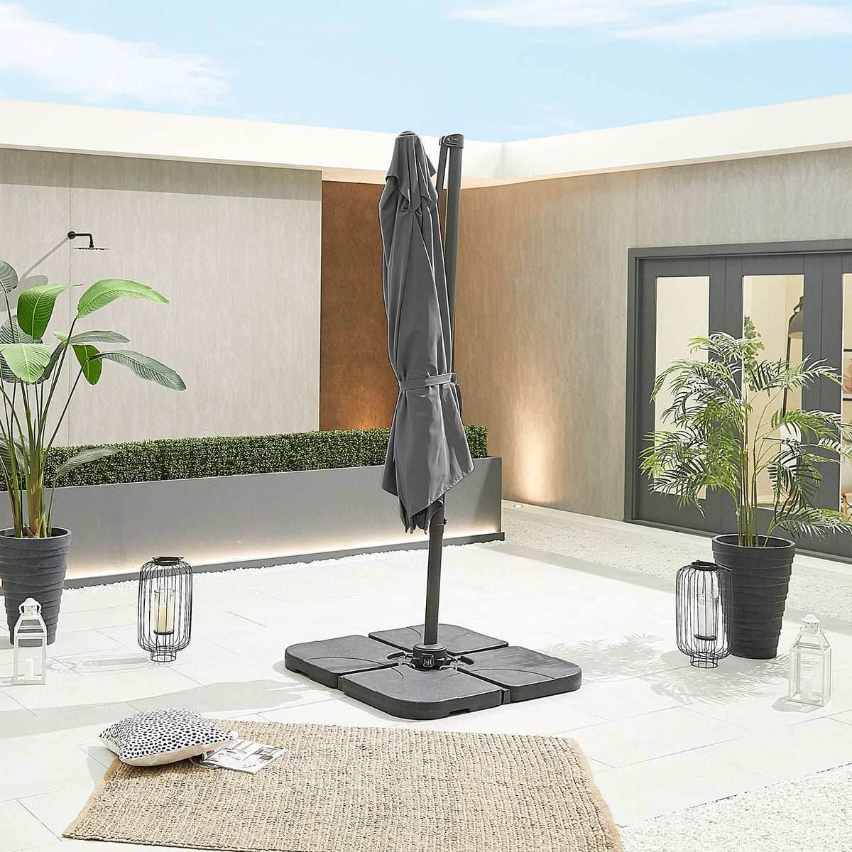 Apollo Cantilever Parasol — in a traditional garden