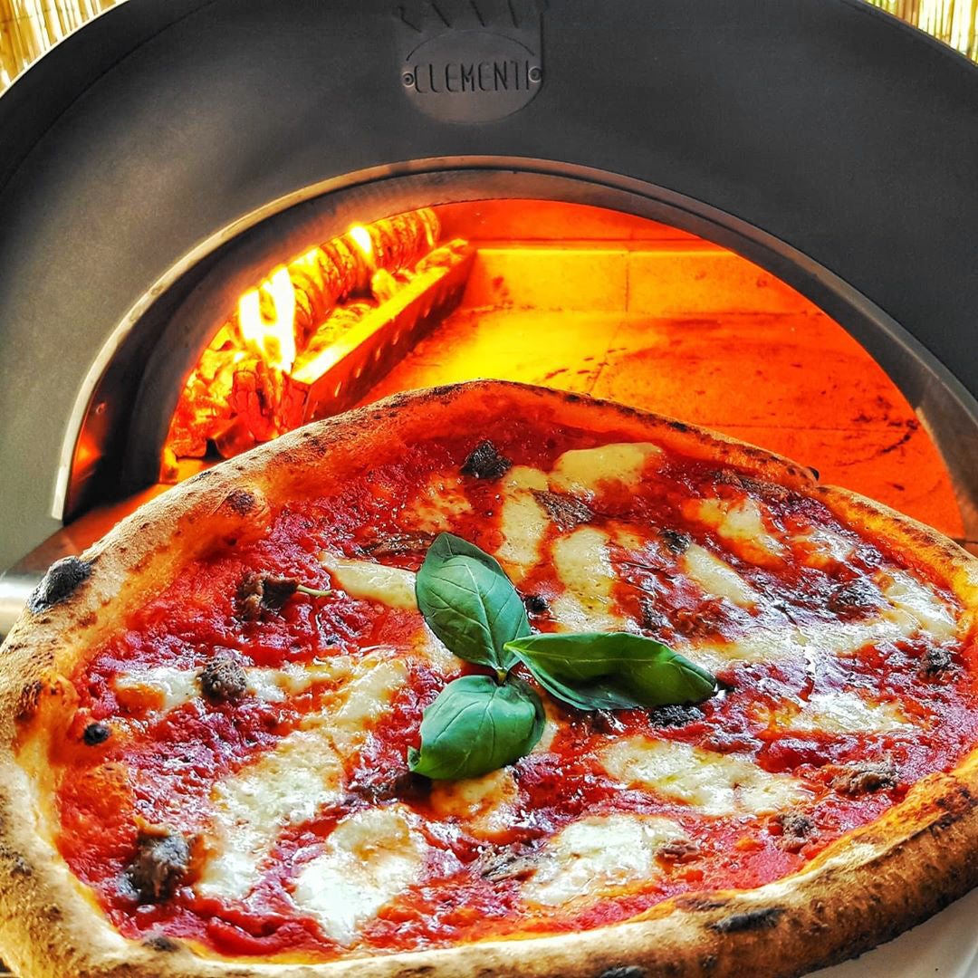 clementi original pulcinella wood fired pizza oven lifestyle exterior view — view 3