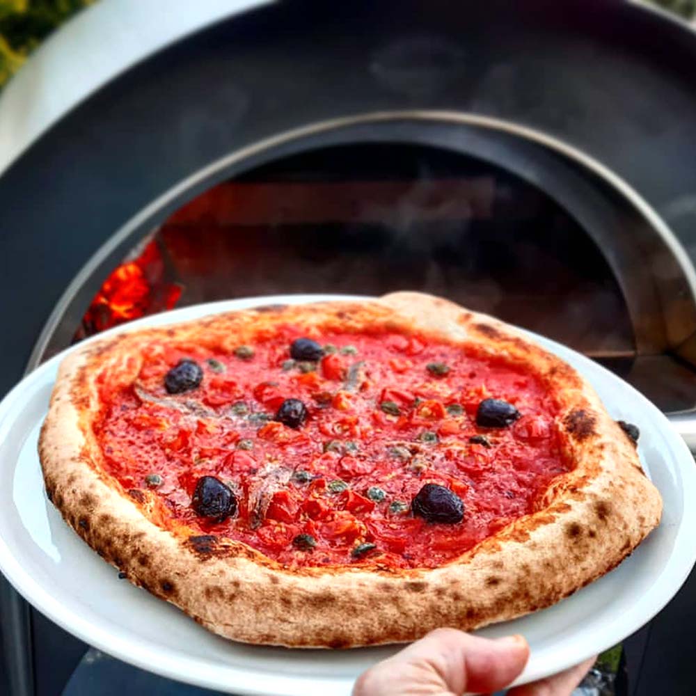 clementi original pulcinella wood fired pizza oven lifestyle exterior view — view 8