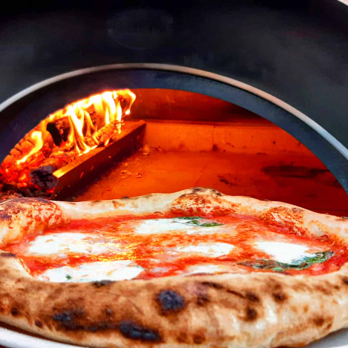 clementi original pulcinella wood fired pizza oven lifestyle exterior view — view 4
