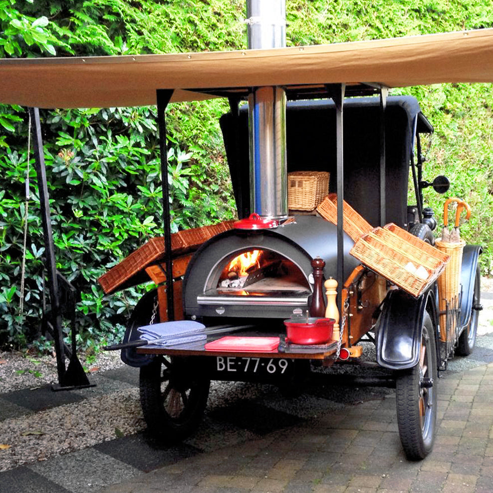 clementi original pulcinella wood fired pizza oven lifestyle exterior view — view 2