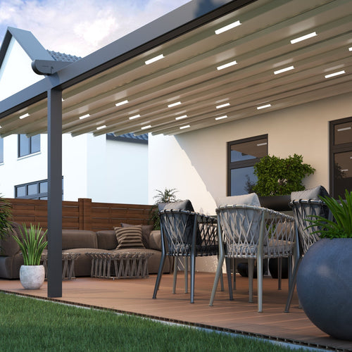 The Verdeca veranda in anthracite from garden with fabric roof partially retracted