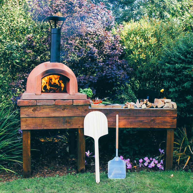 Igneus Ceramiko 600 Wood Fired Pizza Oven — in use outdoors