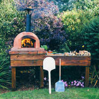Igneus Ceramiko 600 Wood Fired Pizza Oven — in use outdoors