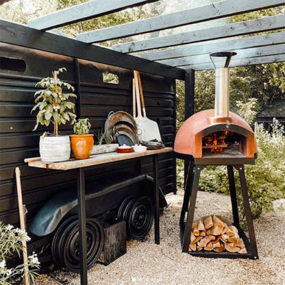 Igneus Ceramiko 760 Wood Fired Pizza Oven — in use outdoors