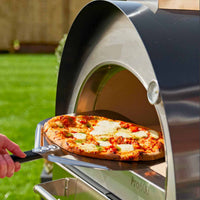 igneus pro 600 wood fired pizza oven lifestyle exterior view — view 2