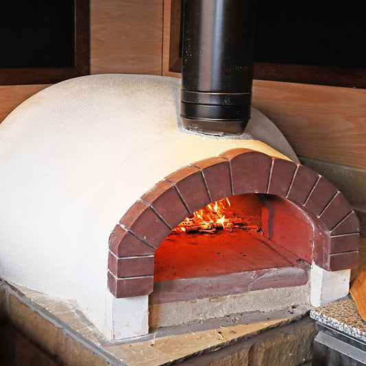 Igneus Ceramiko Pro 1200 Wood Fired Pizza Oven — in use outdoors