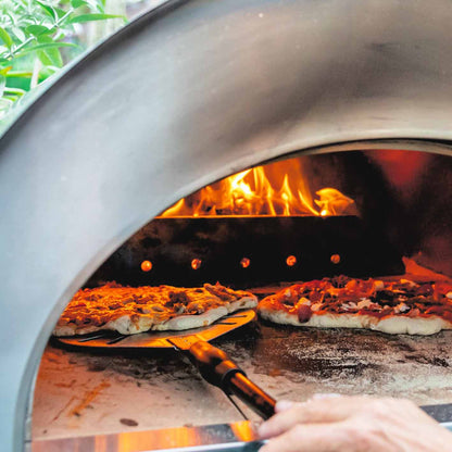 igneus pro 750 wood fired pizza oven lifestyle exterior view