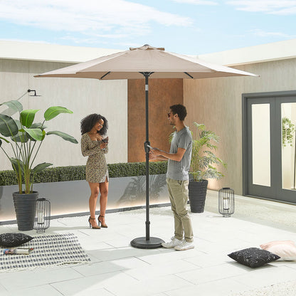 Antigua Aluminium Parasol — in a patio setting