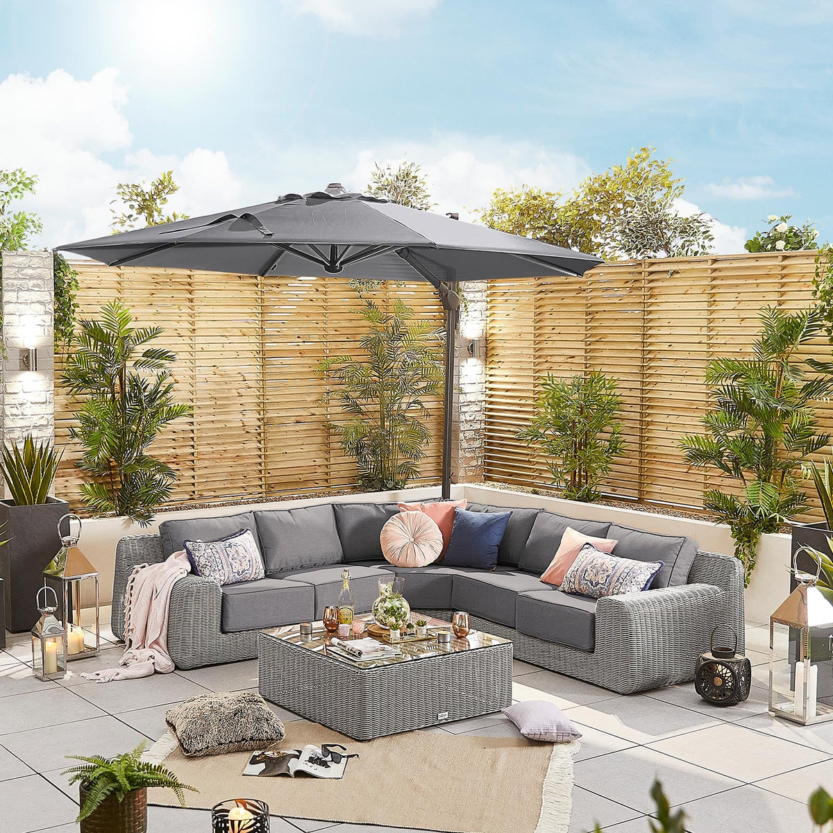 Galaxy Grey Frame LED Cantilever Parasol — styled in a garden setting