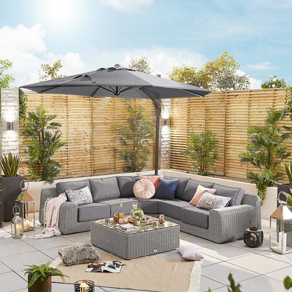 Galaxy Grey Frame LED Cantilever Parasol — styled in a garden setting