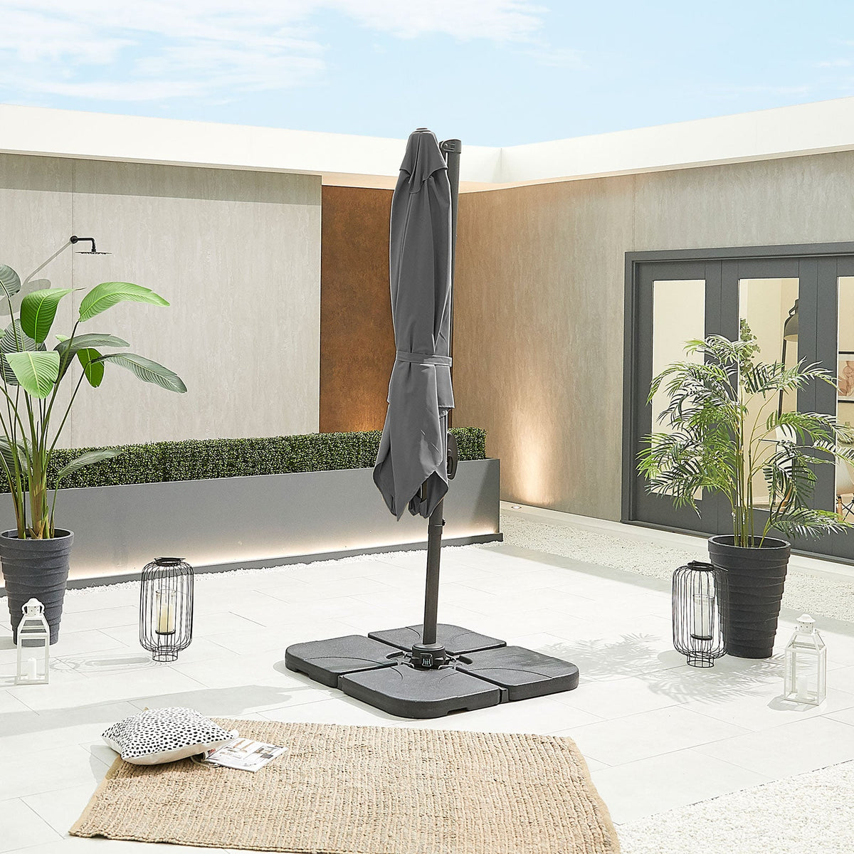 Apollo Cantilever Parasol — in a patio setting