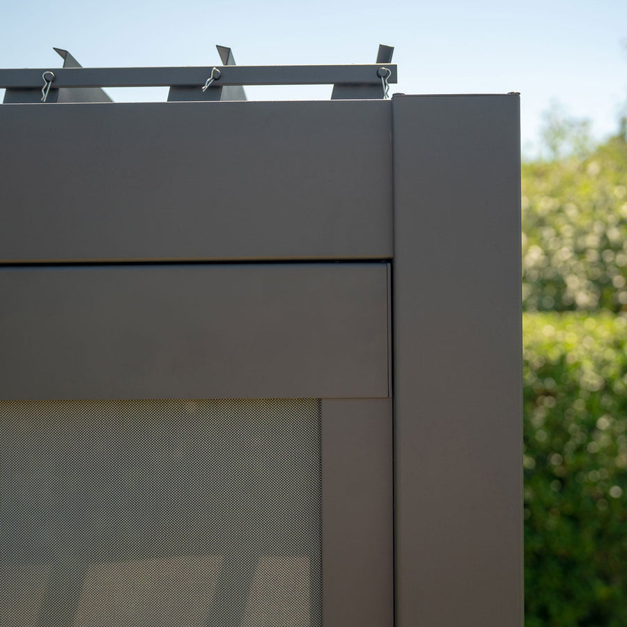 Titan Pergola Pull Down Privacy Screen — in low light