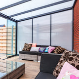 Polycarbonate side wall in anthracite frame installed as a veranda enclosure panel