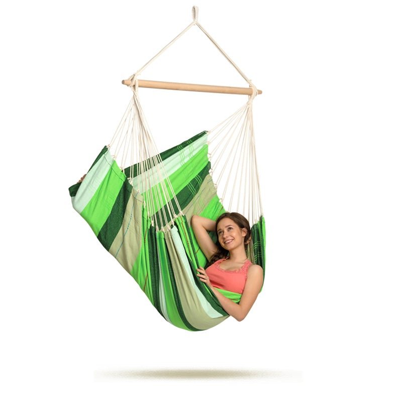 Brasil Oliva Hammock Chair — styled in a garden setting
