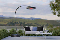 Bromic Eclipse Smart-Heat Portable in a garden lounge setting | Roma Verandas