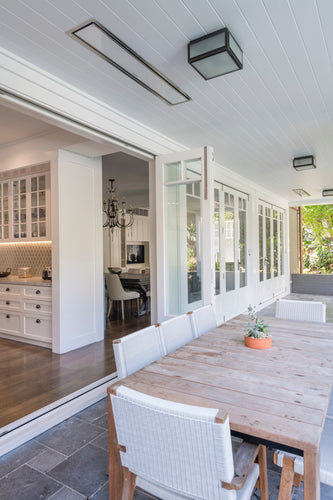 Bromic Platinum Smart-Heat Electric warming an outdoor dining terrace | Roma Verandas