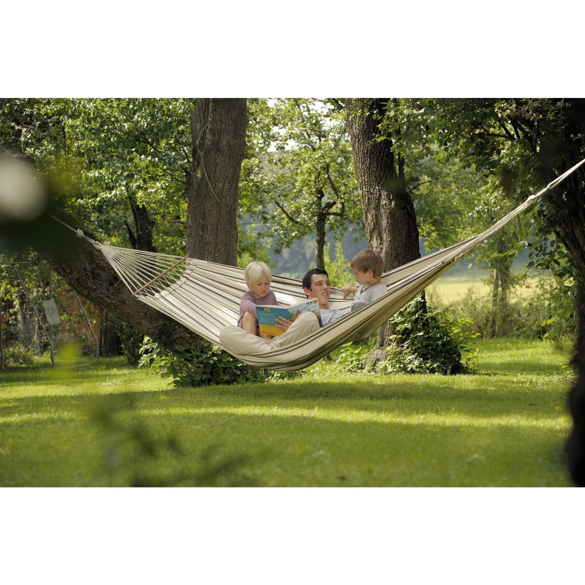 Brasilia Cappuccino Hammock — styled in a garden setting