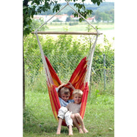 Brasil Papaya Hammock Chair — in use outdoors