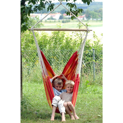 Brasil Papaya Hammock Chair — in use outdoors