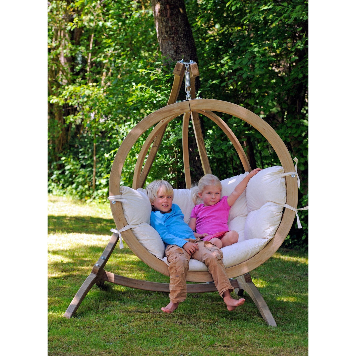 Globo Single Natura Hanging Egg Chair — styled in a garden setting
