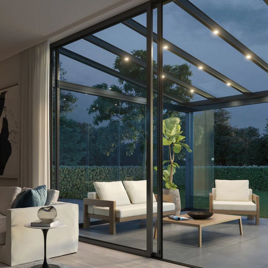 Roma Lumino flush-fit LED spotlight kit installed in aluminium veranda roof panel