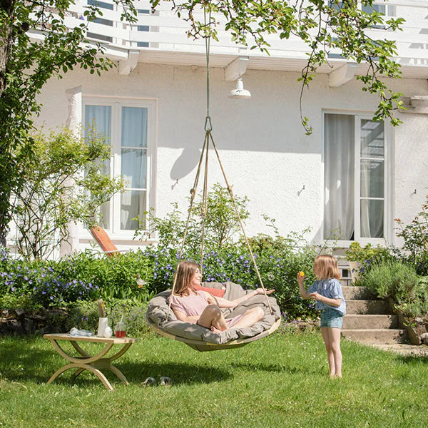 swing nest hanging chair taupe lifestyle exterior view